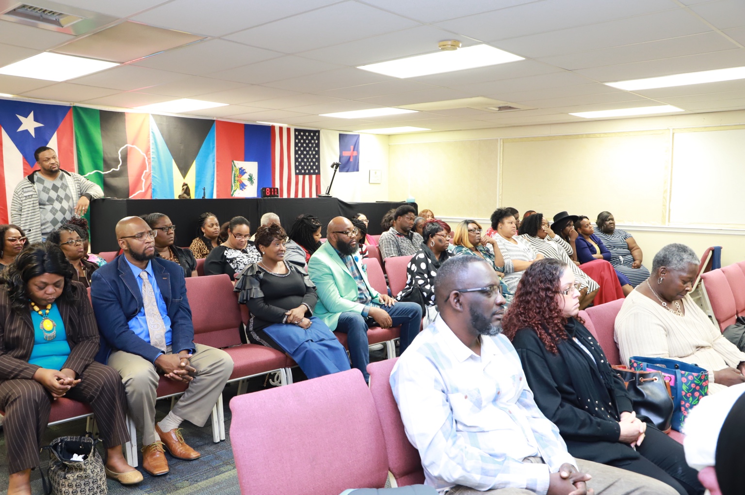 An audience seated together at a ministry gathering